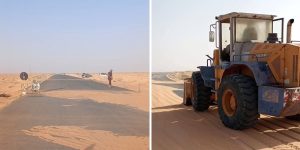 متطوعون يزيلون الرمال المتكدّسة على الطرق ب"بدر"