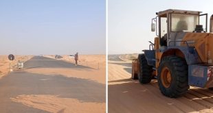 متطوعون يزيلون الرمال المتكدّسة على الطرق ب"بدر"