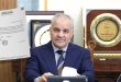 صورة لمحافظ مصرف ليبيا المركزي ناجي عيسى أو المبنى الرئيسي لمصرف ليبيا المركزي في طرابلس.
