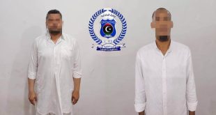 شعار جهاز المباحث الجنائية الليبي أو جانب من عمليات المتابعة والتحري الأمني بالمنطقة الجنوبية.